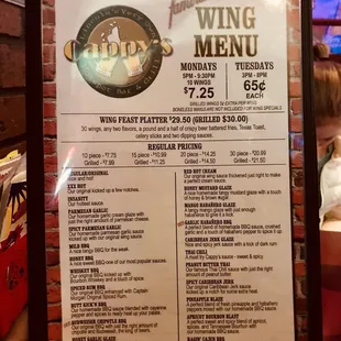 The wings menu. Talk about sauce selections.