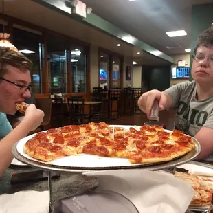 Pepperoni pizza on top. Cheese and onion pizza below. Deee-licious!