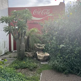  coca cola sign and fountain