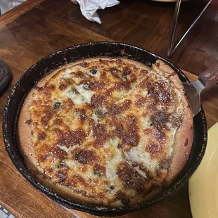 Small Chicago with sausage, black olives, and caramelized onions