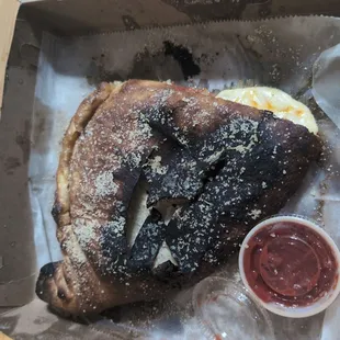 my calzone was burnt and had 3 pieces of pepperoni.  breadsticks burnt too.