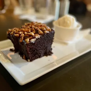 Warm chocolate sheet cake with vanilla ice cream