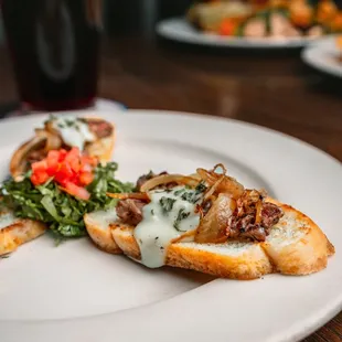 Steak, Grilled Onions &amp; Blue Cheese Crostini.