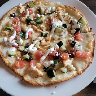 a flatbread pizza on a plate