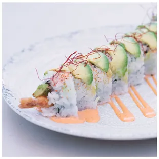 a sushi roll with avocado
