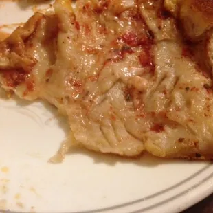 It looks like cheese, but its RAW dough. That is ALL dough.  To go orders are NOT recommended.