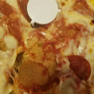 Closer picture. I asked for extra sauce. I lifted up cheese you can see there is no saice