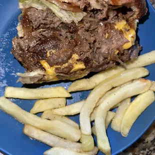 Inside of Cheesesteak meaty &amp; very good! Mayo, fried Onions, lettuce &amp; tomato