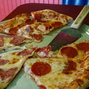 Pizza one side ham the other pepperoni and extra cheese we had to get a fork it was so hot we had to cut it.