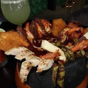 From their regular menu, we tried the overflowing Molcajete loaded with meat &amp; seafood - perfect for sharing.