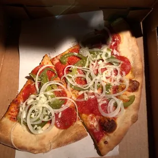 a slice of pizza in a box