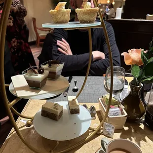 Dessert tower -- cheesecakes on top
