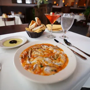 Portobello Capriccio - portobello mushrooms sauteed in our signature white wine sauce with tomatoes topped with mozzarella cheese.