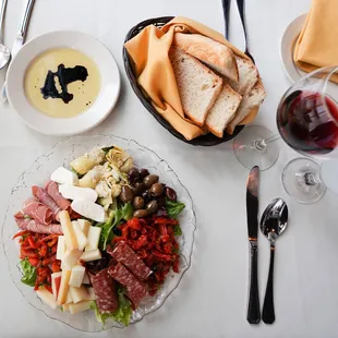 Antipasti for two - marinated artichokes, prosciutto, salami, sun dried tomatoes, olives, roasted peppers &amp; market cheeses.