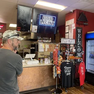 a man standing in a restaurant
