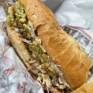 This one is so good! It's a Thanksgiving sandwich. Stuffing and turkey and I get the cranberry sauce on the side.