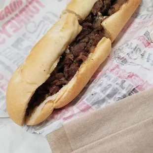 Medium classic cheesesteak with added fried peppers, the menu picture comparison to this VERY disappointing. Not again, I&apos;m good..