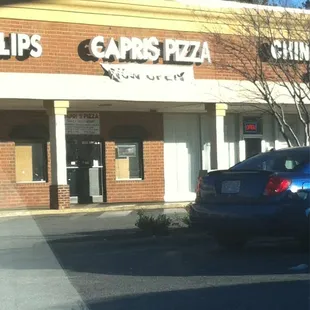 a car parked in front of a building