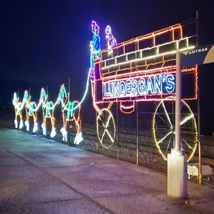 Christmas lights with current owner's last name.