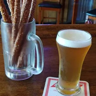 a beer and pretzels