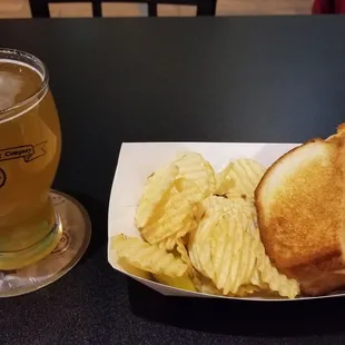 Tangerine Passionfruit Gose with Buffalo Chicken Grilled Cheese Sandwich (bacon added) and side of chips via Get Cheesy.  A very nice night.