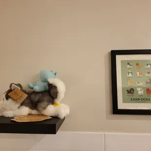 a stuffed animal on a shelf