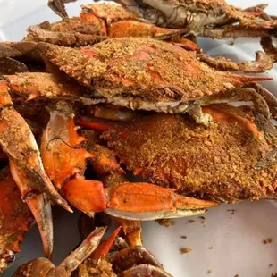 a pile of crabs on a plate