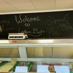 a chalkboard with the words welcome