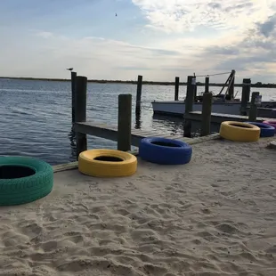 a row of tires on the beach