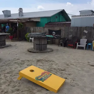 a corn hole on the beach