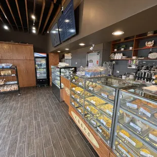 the bakery counter with a variety of baked goods