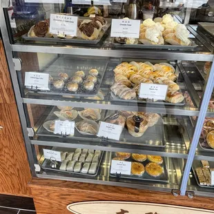 a display case full of pastries