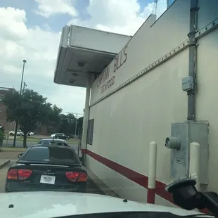 cars parked in front of a building