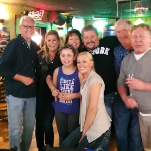 a group of people posing for a picture