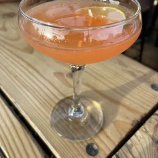 a cocktail in a coupe glass