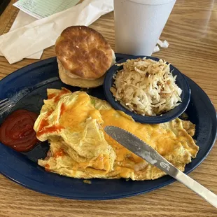 western omelette, hash browns, and a biscuit