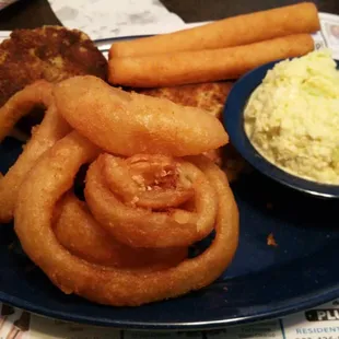 Crab cakes onion rings Cole slaw and corn bread sticks