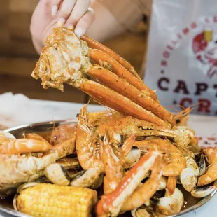 crab legs and corn on the cob