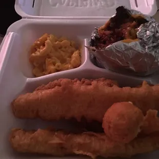 Fried fish, chicken, loaded potatoes