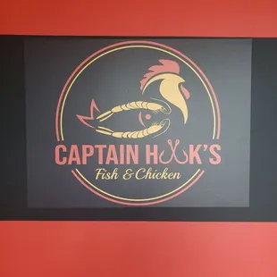 The logo. Clever, cute. It&apos;s a chicken, with a fish, with shrimp.