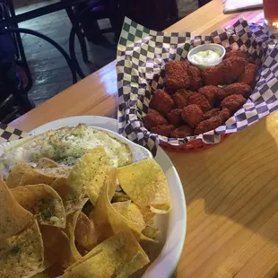 Artichoke dip and spicy cod pieces! So good