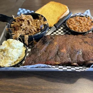 2 meat combo ribs ,pulled pork,potato salad , bbq beans, and garlic toast