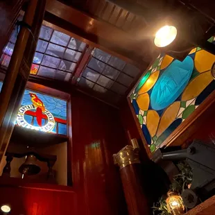 Kitschy Decor above the host table near the bar