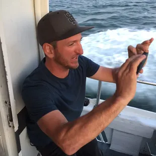 Captain Dave snapping pics of the cruisers. Funny and full of info, captain Dave is the king of wharf tours.