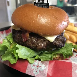 A freshly grilled burger made of Angus beef