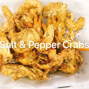 salt and pepper crabs in a container