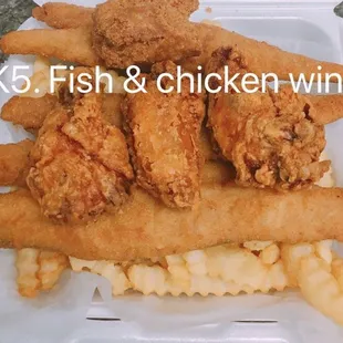 chicken wings and macaroni in a styrofoam container