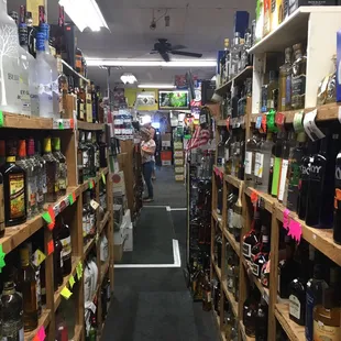 the aisle of a liquor store