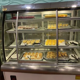 a display case filled with food