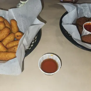Hush puppies w/honey and crab balls w/cocktail sauce